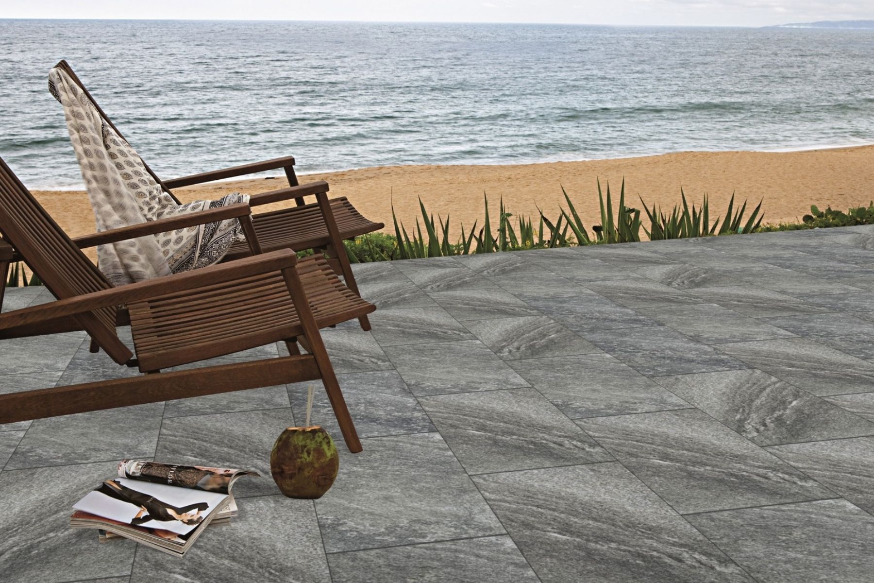 natural stone porcelain pavers used in outdoor open area by beach side home