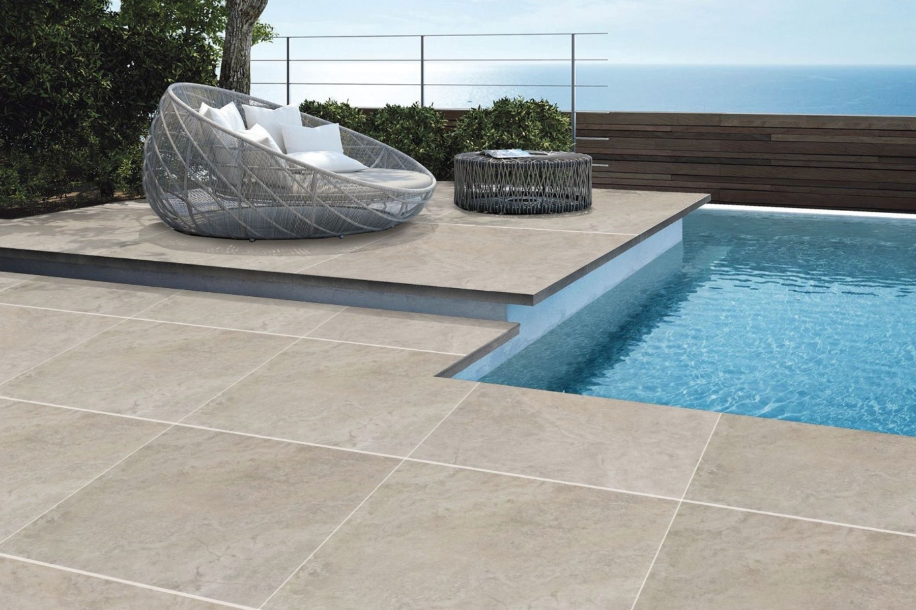 travertine porcelain pool pavers in beige 600x600x20mm with elevated tanning desk