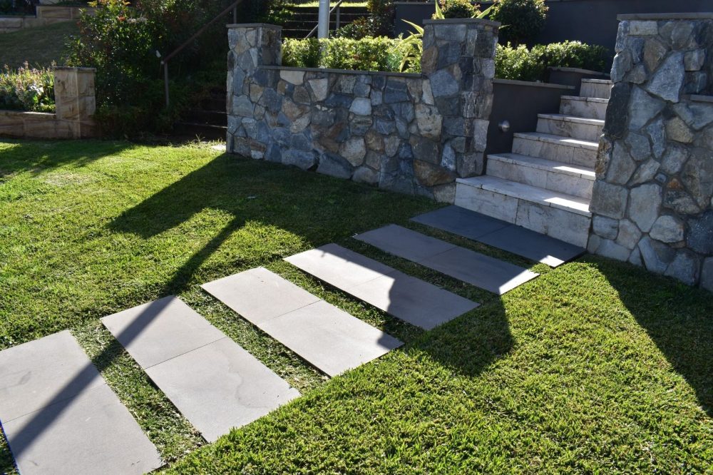 stepping stones in bluestone at front of house leading to stairs
