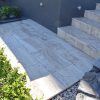 travertine stair case with landing area